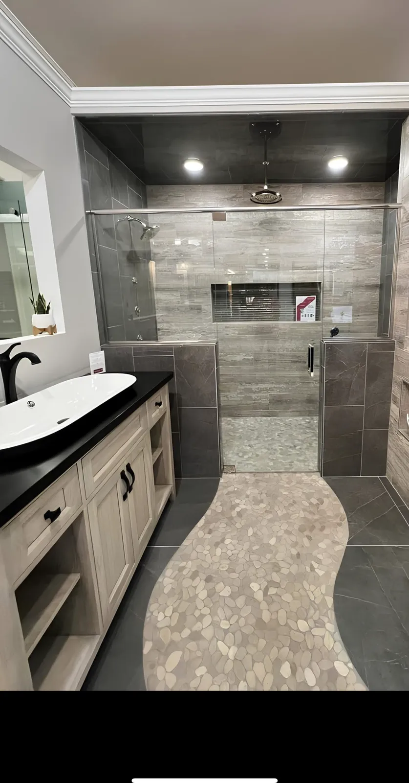 Walk-in shower with tiled niche shelves